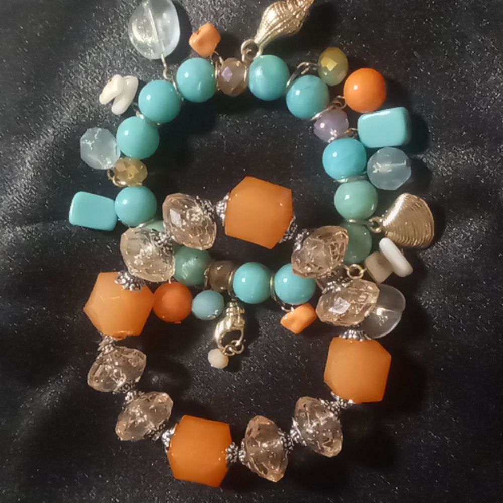 2 expandable bracelet beaded with gold tone shells natural shells & beads